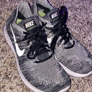 Grey Nike fly knit shoes